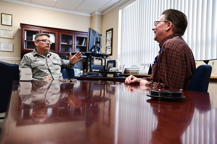 Wingman Advocate Andrew Kalinen talks with his host commander, Col. Paul Smith, about the 748th Supply Chain Management Group’s people issues. (U.S. Air Force photo/R. Nial Bradshaw)