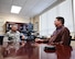 Wingman Advocate Andrew Kalinen talks with his host commander, Col. Paul Smith, about the 748th Supply Chain Management Group’s people issues. (U.S. Air Force photo/R. Nial Bradshaw)