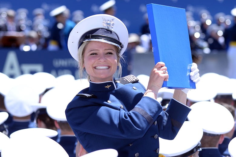 Second Lt. Chloe Forlini holds her diploma after graduating with the U.S. Air Force Academy's Class of 2017, May 24, 2017, at Falcon Stadium. (U.S. Air Force photo/Jason Gutiarrez)  