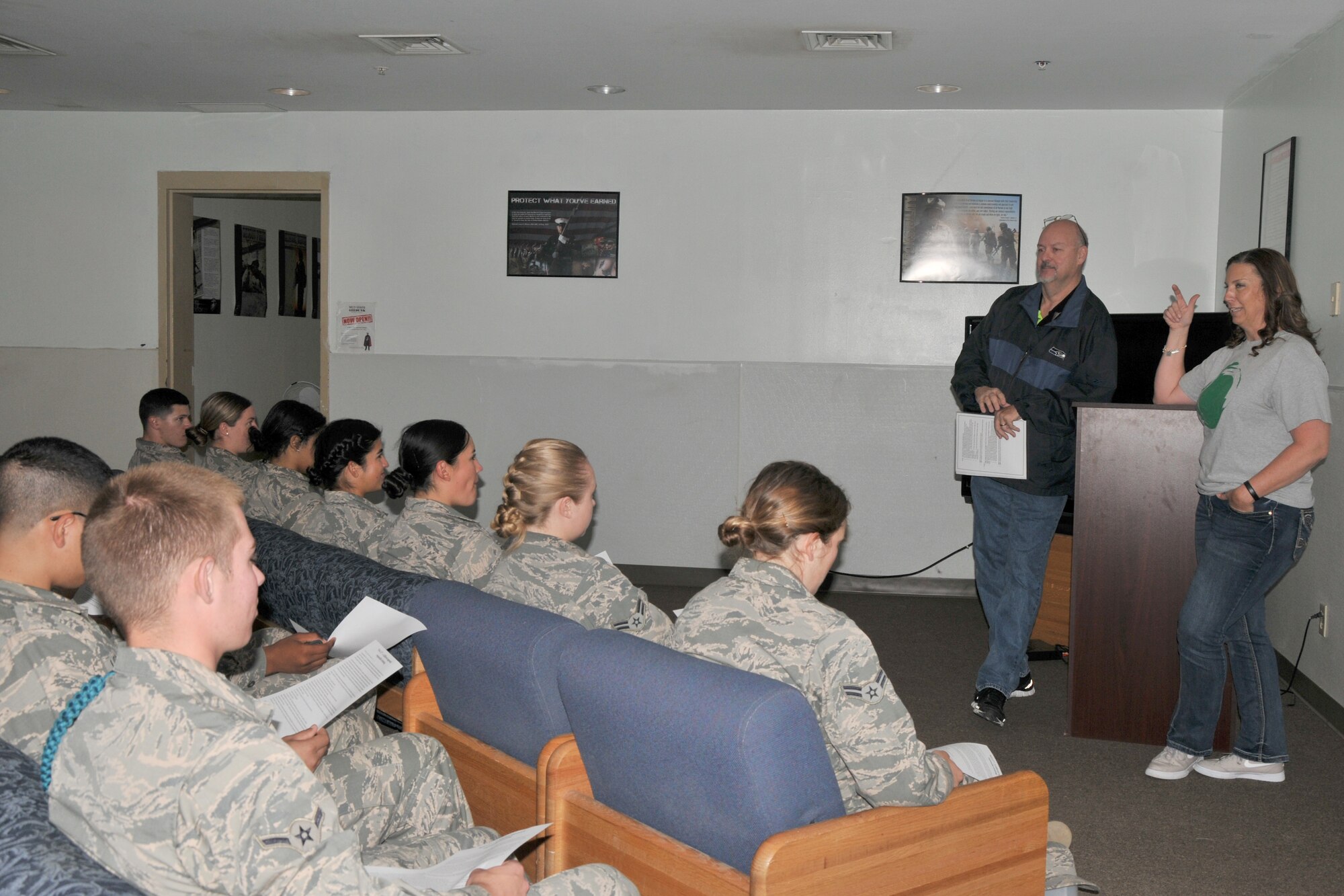 David Sullins, 17th Training Wing community support coordinator, and Megan Fowler, 17th Training Wing Green Dot coordinator, discuss responsible drinking habits with strudents from the 315th Training Squadron at the Marine Corps Detatchment on Goodfellow Air Force Base, Texas, May 25, 2017. The facilitators encouraged the students to share their experiences and provide tips on how to drink responsibly. (U.S. Air Force photo by Airman 1st Class Randall Moose/Released)