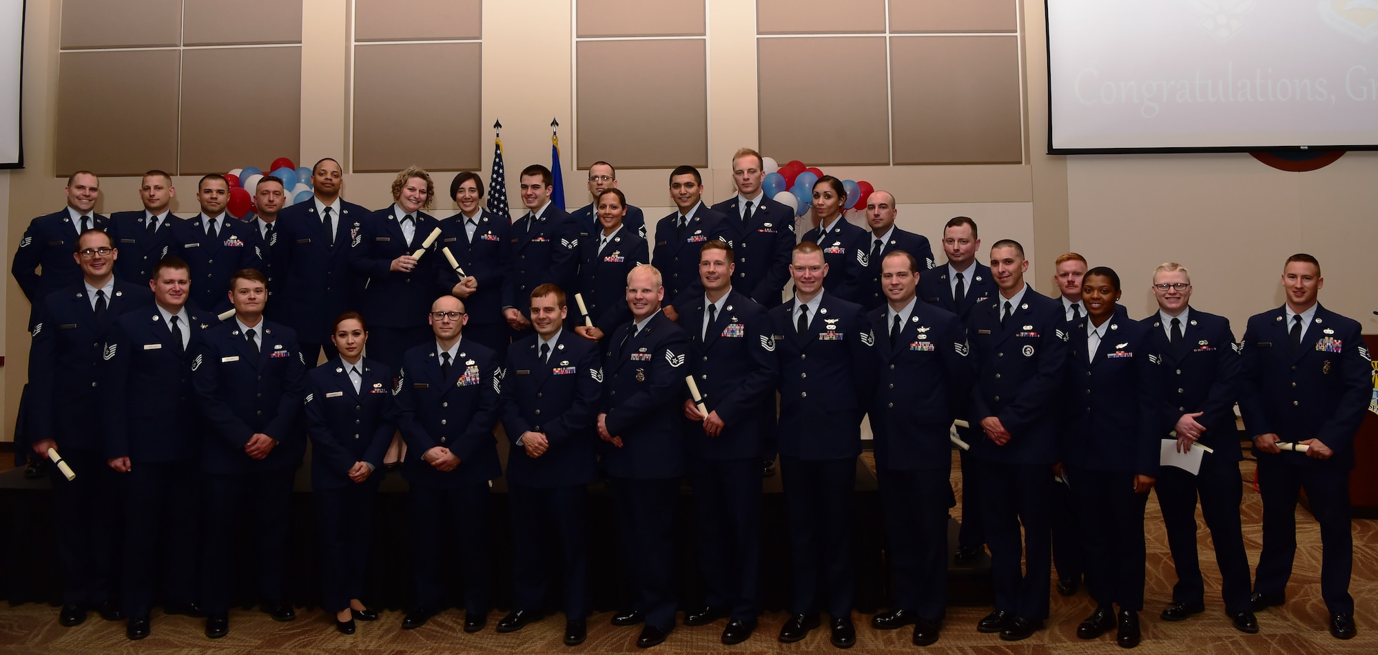 Airmen from Buckley Air Force Base graduated from The Community College of the Air Force, May 24, in a ceremony at the Leadership Development Center here. (U.S. Air Force photo by Airman 1st Class Jessica Huggins)