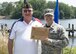 Lt. Col. Todd Walker, 436th Logistics Readiness Squadron commander, presents a plaque to Ed Moczulski, Veterans of Foreign Wars Post 6483 commander, at a VFW Adopt a Unit ceremony May 19, 2017, in Milford, Del. Post 6483 formally adopted the 436th LRS as part of its Military Assistance Program. (U.S. Air Force photo by Senior Airman Zachary Cacicia)