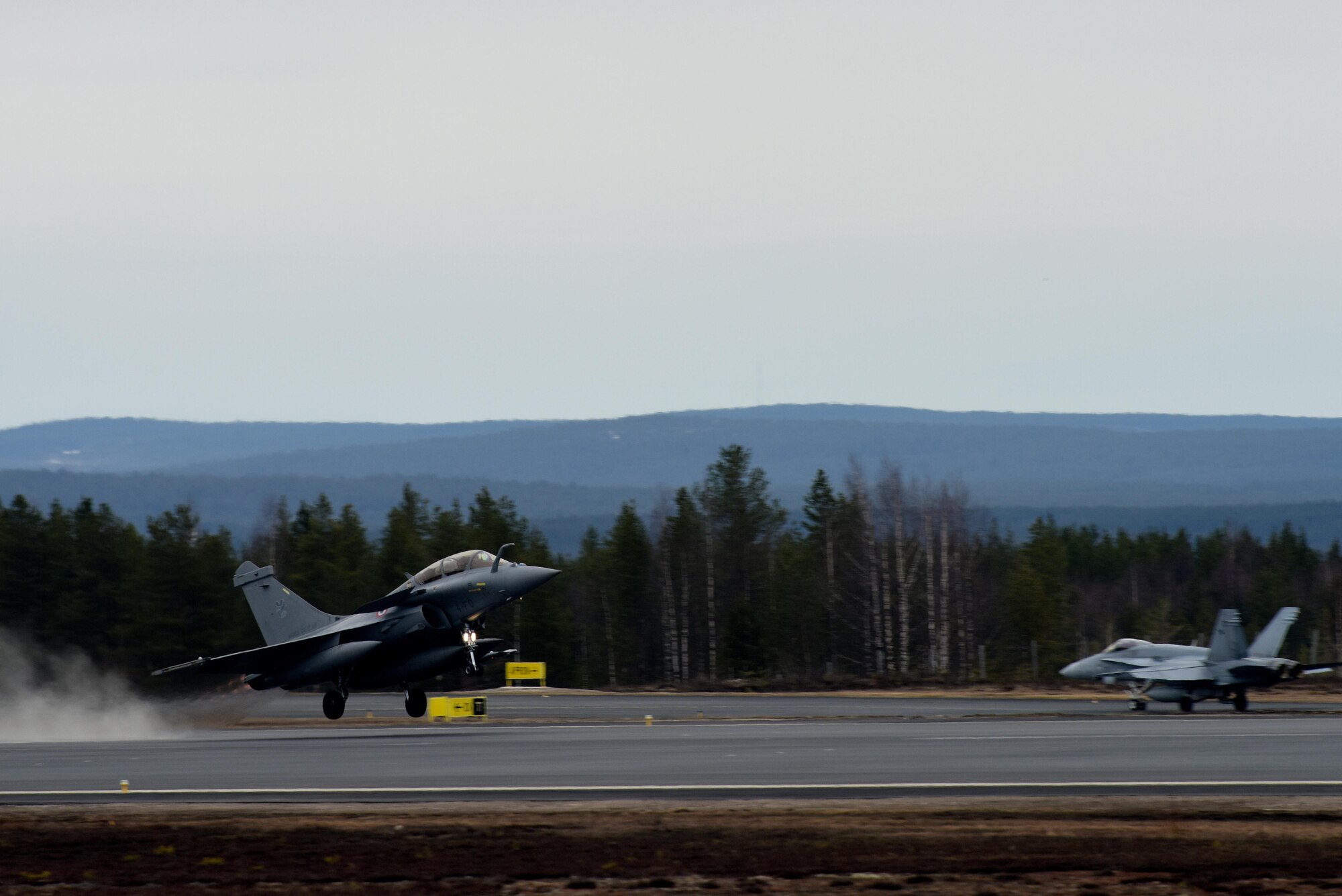 A French Rafale takes off at Rovaniemi Air Base, Finland, May 22, in support of Arctic Challenge 2017. Through exercises like ACE 17, the U.S., allies and partner nations are able to train together in a realistic environment, working to ensure security, protect global interests and strengthen economic bonds in Europe. (U.S. Air Force photo/Airman 1st Class Abby L. Finkel)