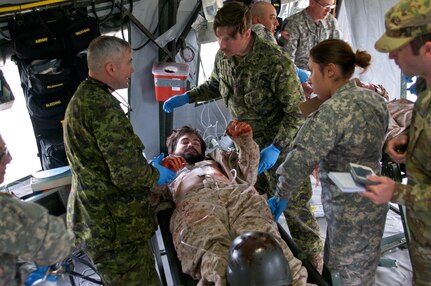 U.S. and Canadian Soldiers in the 491st Medical Support Group clinic treats simulated casualties as part of Maple Resolve 17, the Canadian Army’s premiere brigade-level validation exercise running May 14-29 at Camp Wainwright, Alberta, Canada. 

More than 650 U.S. Army Soldiers are providing a wide array of combat and support elements. These include sustainment, psychological operations, public affairs, aviation and medical units. Reserve units participating in Maple Resolve 17 will sharpen individual skill sets while enhancing overall unit readiness.