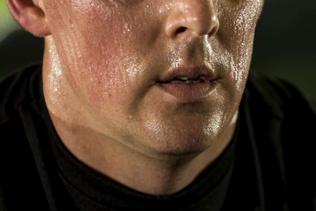 Sweat drips down the face of a U.S. Army Reserve Soldier from the 200th Military Police Command during a Spin class as part of a Performance Triad program organized by the command and hosted on Fort Meade, Maryland, May 9, 2017. The three-week fitness program took place from May 5-25 to help Soldiers who had either failed the Army Physical Fitness Test or had been on the Army Body Fat Composition program. The camp focused on the triad of overall health: physical fitness, nutrition and sleep, by providing education and personalized coaching to Soldiers in all three of those phases of life and more. (U.S. Army Reserve photo by Master Sgt. Michel Sauret)