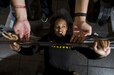 Spc. Jasmine Kearse, a U.S. Army Reserve Soldier from the 200th Military Police Command, bench-presses with the help of a spotter during a Performance Triad program organized by the command and hosted on Fort Meade, Maryland, May 9, 2017. The three-week fitness program took place from May 5-25 to help Soldiers who had either failed the Army Physical Fitness Test or had been on the Army Body Fat Composition program. The camp focused on the triad of overall health: physical fitness, nutrition and sleep, by providing education and personalized coaching to Soldiers in all three of those phases of life and more. (U.S. Army Reserve photo by Master Sgt. Michel Sauret)