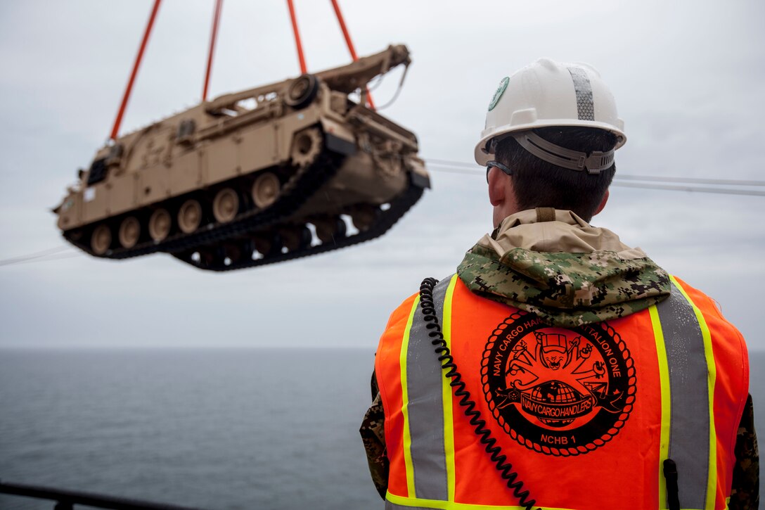 VENTSPILS, Latvia-U.S. Sailors with Navy Cargo Handling Battalion One, conduct the off-loading of tanks during exercise Saber Strike 17 in Ventspils, Latvia, May 23, 2017 Exercise Saber Strike 17 is an annual combined-joint exercise conducted at various locations throughout the Baltic region and Poland. The combined training prepares allies and partners to respond more to regional crises and meet their own security needs by improving the security of borders and countering threats. (U.S. Marine Corps photo by Lance Cpl. Ricardo Davila/Released)