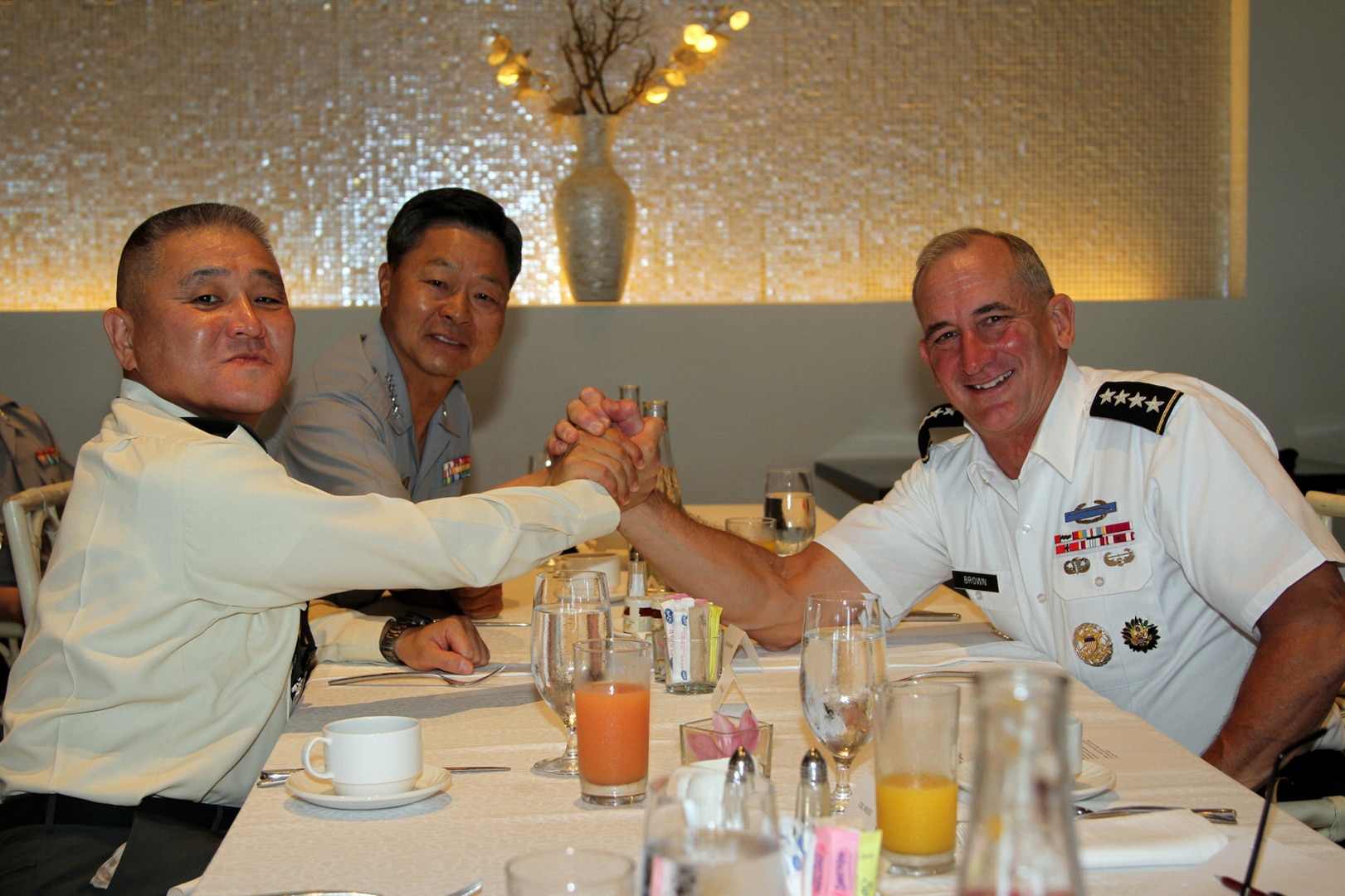 Gen. Robert B. Brown (right), Commanding General, U.S. Army Pacific, held the early morning tri-lateral meeting, in Honolulu, Hawaii, with General Jang Jun-Gyu (center), Chief of Staff of the Republic of Korea Army, and General Toshiya Okabe, Chief of Staff, Japan Ground Self-Defense Force, prior to the start of the 2017 Land Forces Pacific Symposium, May 22. USARPAC's commitment to the defense of its allies, the Republic of Korea and Japan, is ironclad. 