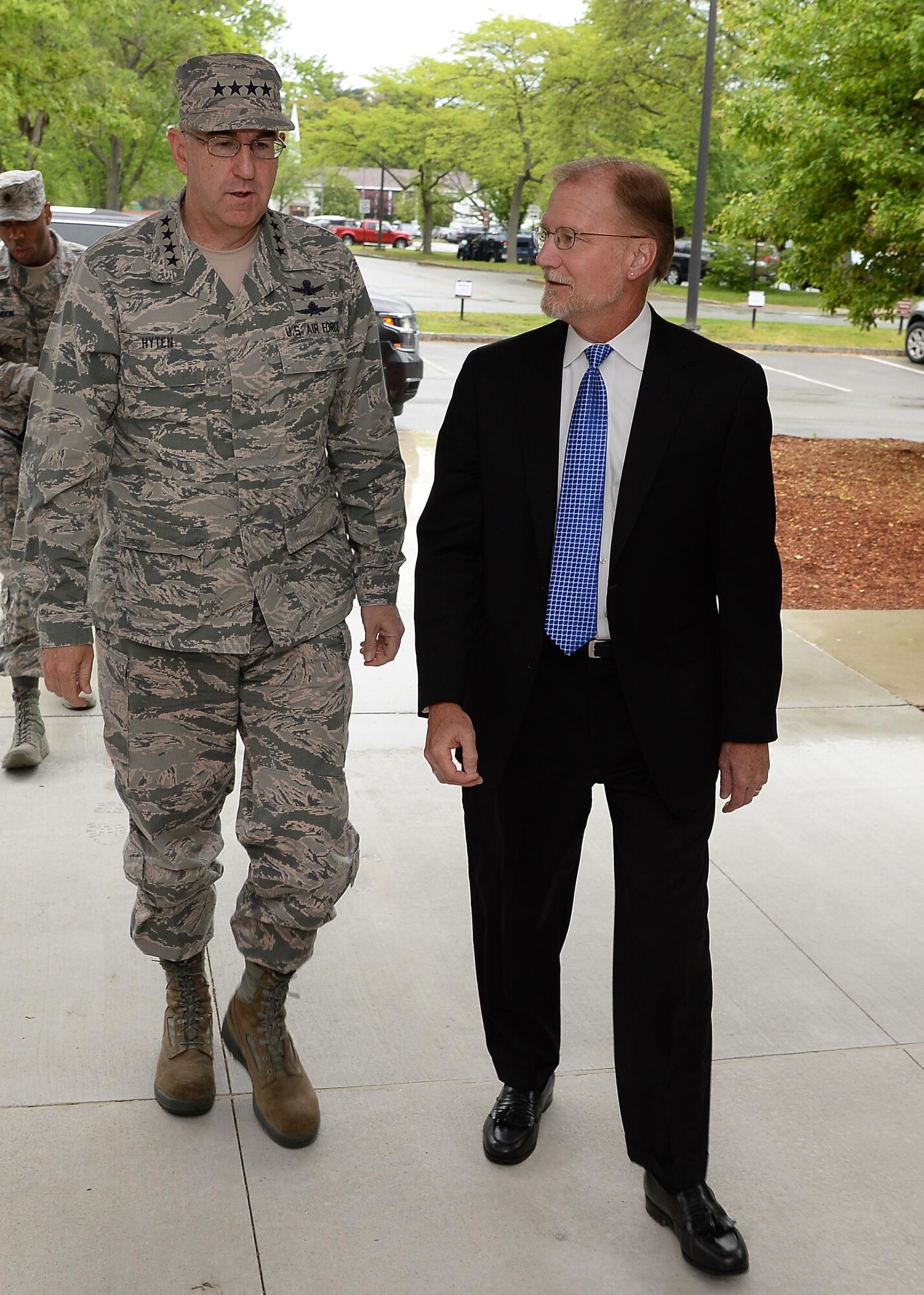 Gen. John E. Hyten, commander of U.S. Strategic Command, and Steve Wert, Battle Management program executive officer, walk to a meeting during the general’s visit to Hanscom Air Force Base, Mass., May 25. Hyten received program briefings from Hanscom’s three Air Force program executive offices, attended meetings at Massachusetts Institute of Technology Lincoln Laboratory and the MITRE Corp. during a multi-day visit. (U.S. Air Force Photo by Jerry Saslav)