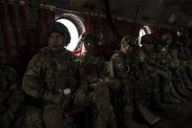 Peruvian air force and U.S. Air Force members fly on a CH-47 Chinook helicopter during Angel Thunder 17 near Davis-Monthan, Ariz., May 9, 2017. Angel Thunder is a two-week, Air Combat Command-sponsored, joint certified and accredited personnel recovery exercise focused on search and rescue. The exercise is designed to provide training for personnel recovery assets using a variety of scenarios to simulate deployment conditions and contingencies. (U.S. Air Force photo by Staff Sgt. Corey Hook)