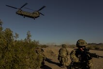 U.S. Air Force and coalition forces await transport during Angel Thunder 17 at Gila Bend, Ariz., May 13, 2017. Angel Thunder is a two-week, Air Combat Command-sponsored, joint certified and accredited personnel recovery exercise focused on search and rescue. The exercise is designed to provide training for personnel recovery assets using a variety of scenarios to simulate deployment conditions and contingencies. (U.S. Air Force photo by Staff Sgt. Corey Hook)