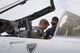 Staff Sgt. Christopher Fisher, A-10 East Heritage Team crew chief, helps Capt. Joseph Morrin, A-10 East Heritage Team pilot, fasten his harness before the heritage flight, May 21, 2017, at Seymour Johnson Air Force Base, N.C. The heritage flight is performed by multiple aircraft at events throughout the United States. Originally established in 1997, the heritage flight showcases the past, present and future generations of aircraft to bolster recruiting. (U.S. Air Force photo by Staff Sgt. Eric Summers Jr.)