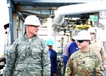 DLA Energy Commander Air Force Brig. Gen. Martin Chapin and DLA Energy Americas East Commander Army Lt. Col. Christian Meisel depart the dock where the Vane Brothers barge, the DS-204, is being loaded at Defense Fuel Support Point Baltimore May 22. Photo by Irene Smith, DLA Energy Public Affairs
