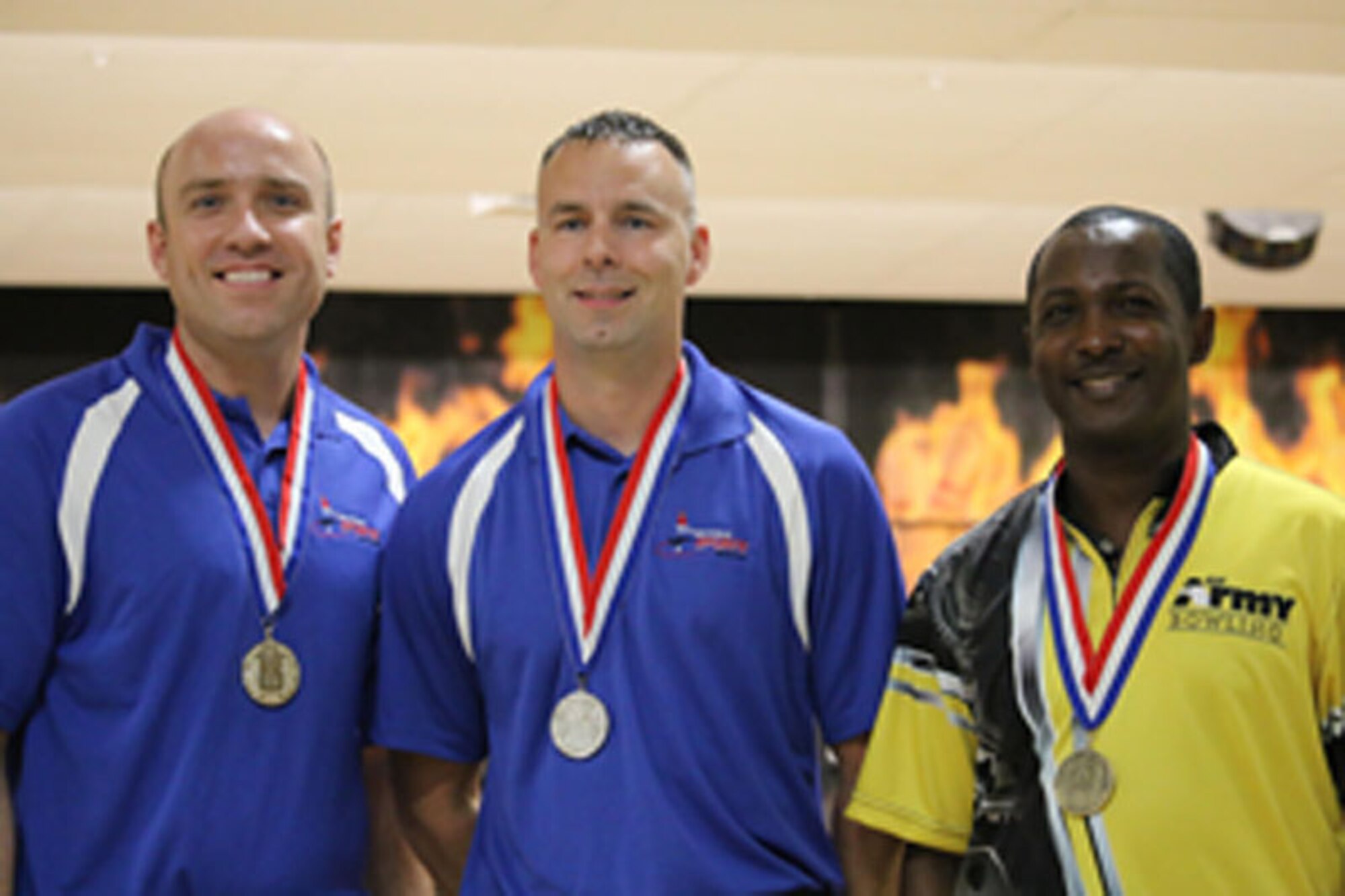 Air Force Staff Sgt. James McTaggart of Nellis AFB, Nevada; Tech. Sgt. Chuck Kropog of Yokota, Air Base, Japan; and Army Sgt. 1st Class Damian Codrington of Fort Hood, Texas take gold, silver and bronze respectively at the Armed Forces Bowling Championship hosted at Marine Corps Base Camp Pendleton, California from 5-8 May at the Leatherneck Lanes.