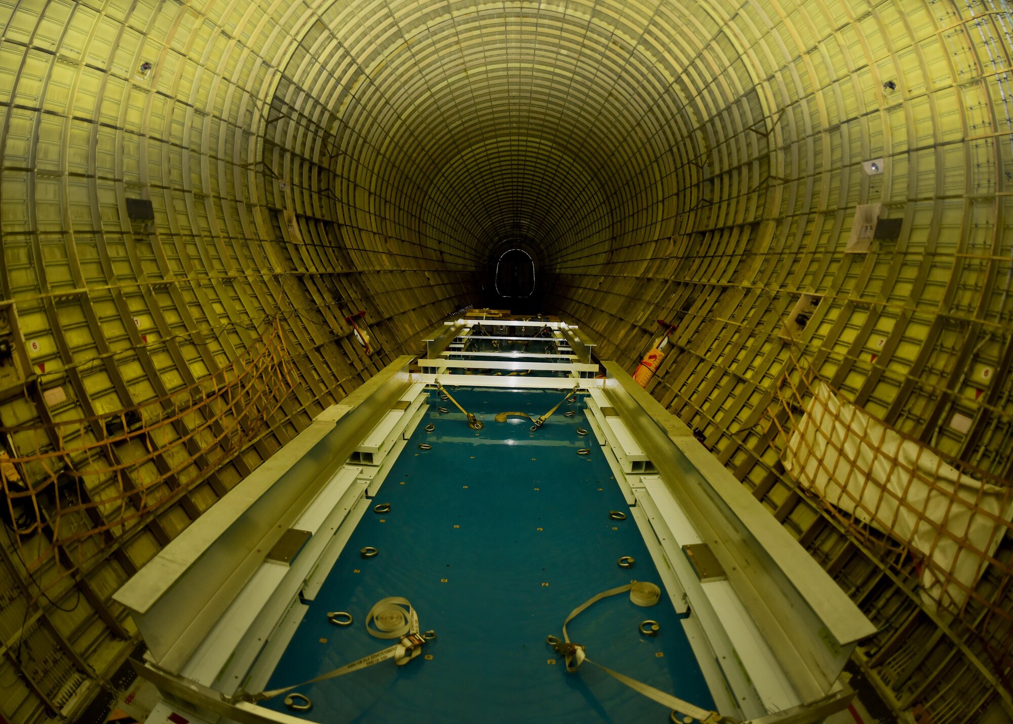 The cargo area of the NASA B-377 Super Guppy lays empty, May 17, 2017, at Altus Air Force Base, Oklahoma. The Super Guppy and a crew of maintainers came to Altus AFB to do routine maintenance on its landing gear inside a hangar large enough to house it. (U.S. Air Force photo by Senior Airman Kirby Turbak/Released)