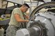 Airmen Antony Miranda, 361st Training Squadron student learns how to install the reduction gear box onto a T-56 engine at Sheppard Air Force Base, Texas, May 23, 2017. This training course lasts 15 weeks with a total of nine blocks.(U.S. Air Force photo by Liz H. Colunga/Released)