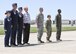 Capt. Sara Harper, Maj. Warren Smith and Capt. Glen Goncharow of the U.S. Air Force Thunderbirds recognize members of Team Tinker for their outstanding accomplishments May 21, 2017, at the Star Spangled Salute Air Show at Tinker Air Force Base, Okla. Arthur McCool, 776th Maintenance Squadron, 1st Lt. Aaron Wolfe, 507th Maintenance Group, Petty Officer Megan Rethford, 448th Supply Chain Management Wing and Senior Airman Jeff Mattocks, 960th Airborne Air Control Squadron were all recognized for their exemplary performance in their primary duties. Wolfe, who is a Reserve maintenance officer and a mission support executive officer, managed 800 flying sorties, 3,352 mission flying hours and more than 22 million lbs. of fuel distributed to multiple weapon systems. (U.S. Air Force photo/Mark Hybers)