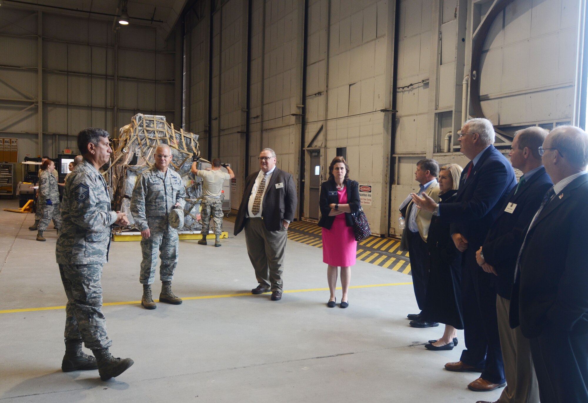 Senior Master Sgt. Luis Agredo, air transportation instructor, gives welcomed educators from the Technical College System of Georgia a tour of the Transportation Proficiency Center at Dobbins Air Reserve Base May 22, 2017. The group, which included representatives from Chattahoochee Technical College, learned about Air Force Reserve training programs that potentially align with TCSG programs. (U.S. Air Force photo/Don Peek)
