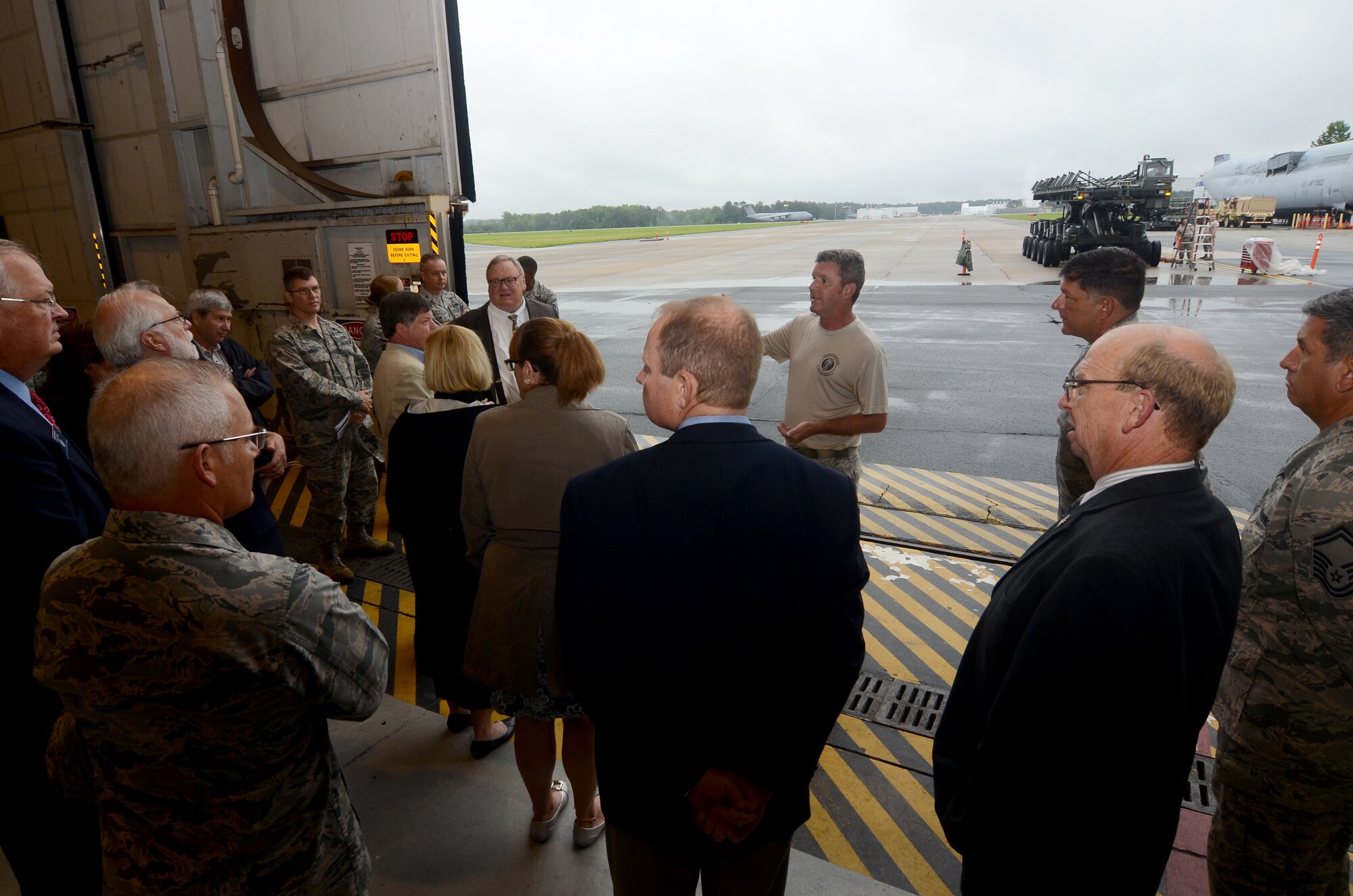 Master Sgt. Frederick Proctor, air transportation instructor, gives an overview of the Transportation Proficiency Center mission to educators from the Technical College System of Georgia during a tour and partnership meeting at Dobbins Air Reserve Base May 22, 2017. The group, which included representatives from Chattahoochee Technical College, learned about Air Force Reserve training programs that potentially align with TCSG programs. (U.S. Air Force photo/Don Peek)