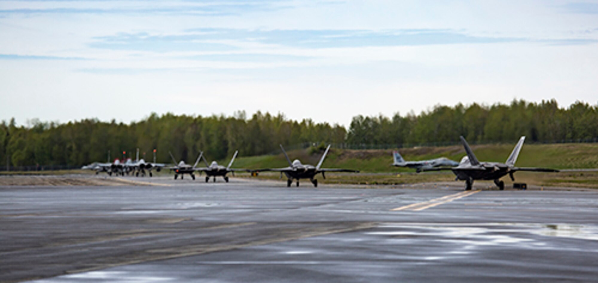 U.S. Air Force and Marine Corps aircraft prepare to conduct flight operations during exercise Distant Frontier at Joint Base Elmendorf-Richardson, Alaska, May 23, 2017. Distant Frontier is a unit-level training iteration designed to sharpen participants' tactical combat skills and develop interoperable plans and programs across the joint force. (U.S. Marine Corps photo by 1st Lt. Melissa M. Heisterberg)