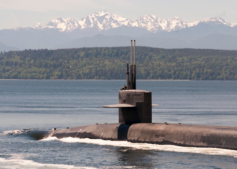 The Ohio-class ballistic-missile submarine USS Louisiana transits the Hood Canal in Puget Sound, Wash., as it returns to its homeport following a strategic deterrent patrol, May 22, 2017. The Louisiana is one of eight ballistic-missile submarines stationed at Naval Base Kitsap-Bangor in Washington providing the most survivable leg of the strategic deterrence triad for the United States. Navy photo by Lt. Cmdr. Michael Smith