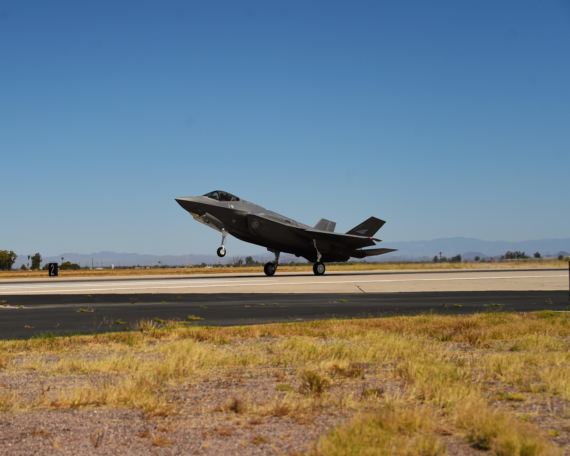 AM-5, Norway’s fifth F-35 Lightning II, touches down for the first time May 25, 2017 at Luke Air Force Base, Ariz. With nine countries involved in its development (United States, United Kingdom, Italy, Netherlands, Turkey, Canada, Denmark, Norway and Australia), the F-35 represents a new model of international cooperation, ensuring U.S. and Coalition partner security well into the 21st Century. (U.S. Air Force photo by Airman 1st Class Caleb Worpel)