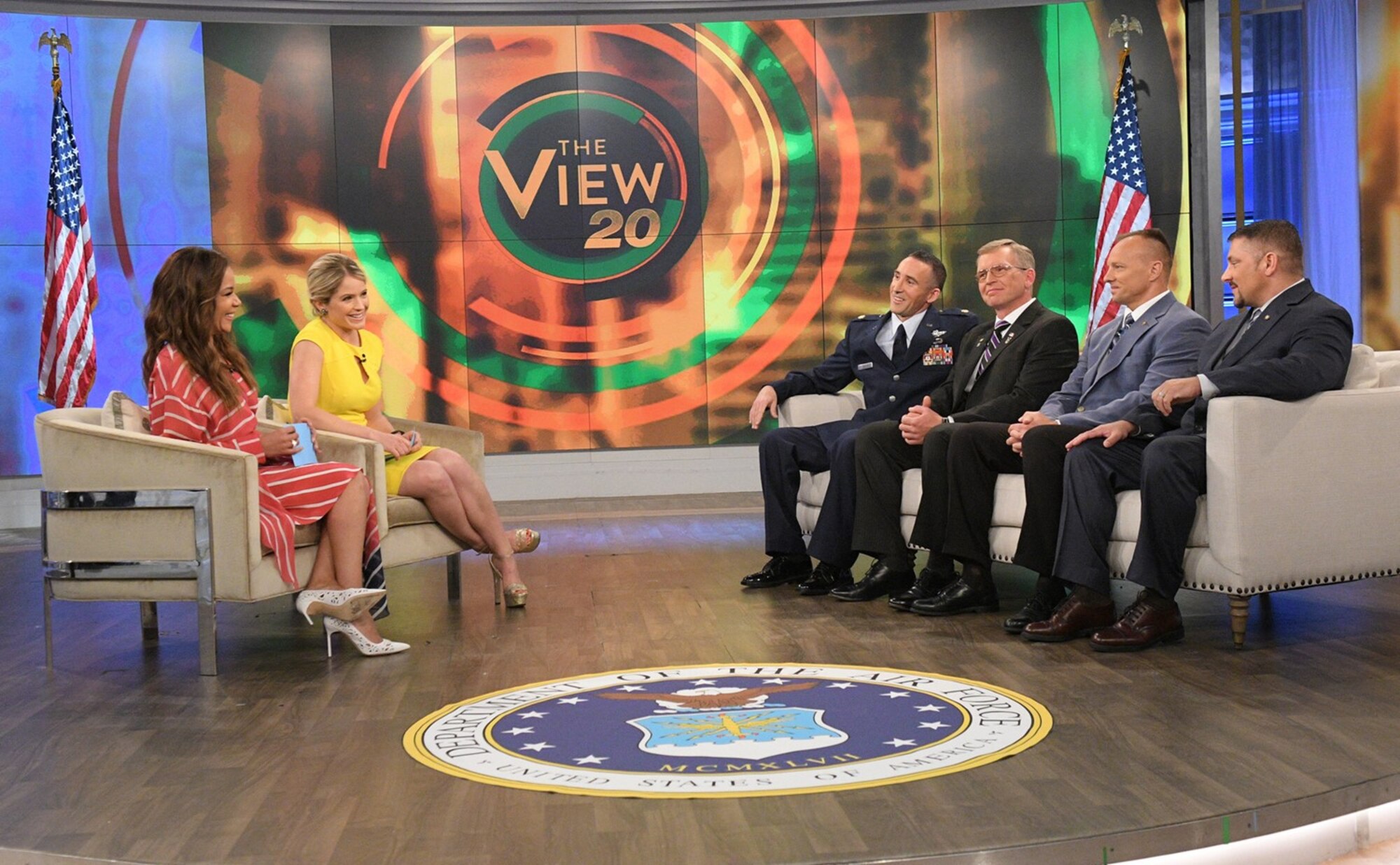 ABC’s “The View” hosts Sunny Hostin and Sara Haines talk with (l-r) Lt. Col. Thomas Lessner, retired Master Sgt. Christian MacKenzie, retired Senior Master Sgt. Randy Kensey and retired Senior Master Sgt. Robert Colanino. The four airmen were reunited on the show May 25, more than a decade since their MH-53 helicopter crashed in Iraq in 2004. (ABC courtesy photo).