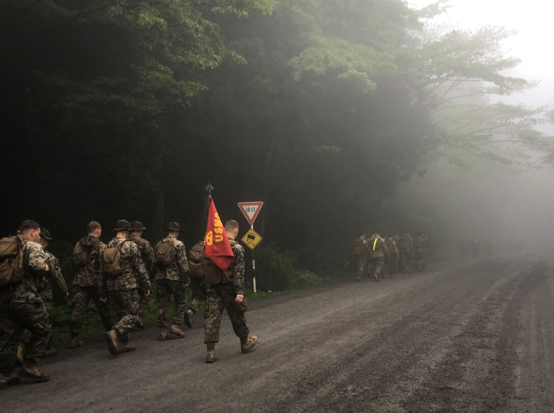 Marines participate in the 50-mile hike challenge, May 15-17, 2017, at Combined Arms Training Center Camp Fuji, Japan. The 50-mile hike challenge dates back to 1908 when President Theodore Roosevelt signed Executive Order 989, requiring lieutenants and captains in the Marine Corps to walk 50-miles in no more than 20 hours. The Marines are with 3rd Battalion, 8th Marine Regiment forward deployed from Camp Lejeune, North Carolina to III Marine Expeditionary Force under the unit deployment program. (Photo courtesy of Maj. Patrick Murray)