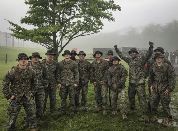 Marines stand together at the end of the 50-mile hike challenge on, May 17, 2017, at Combined Arms Training Center Camp Fuji, Japan. The 50-mile hike challenge dates back to 1908 when President Theodore Roosevelt signed Executive Order 989 requiring lieutenants and captains in the Marine Corps to walk 50-miles in no more than 20 hours. The Marines are with 3rd Battalion, 8th Marine Regiment forward deployed from Camp Lejeune, North Carolina to III Marine Expeditionary Force under the unit deployment program. (Photo courtesy of Maj. Patrick Murray)