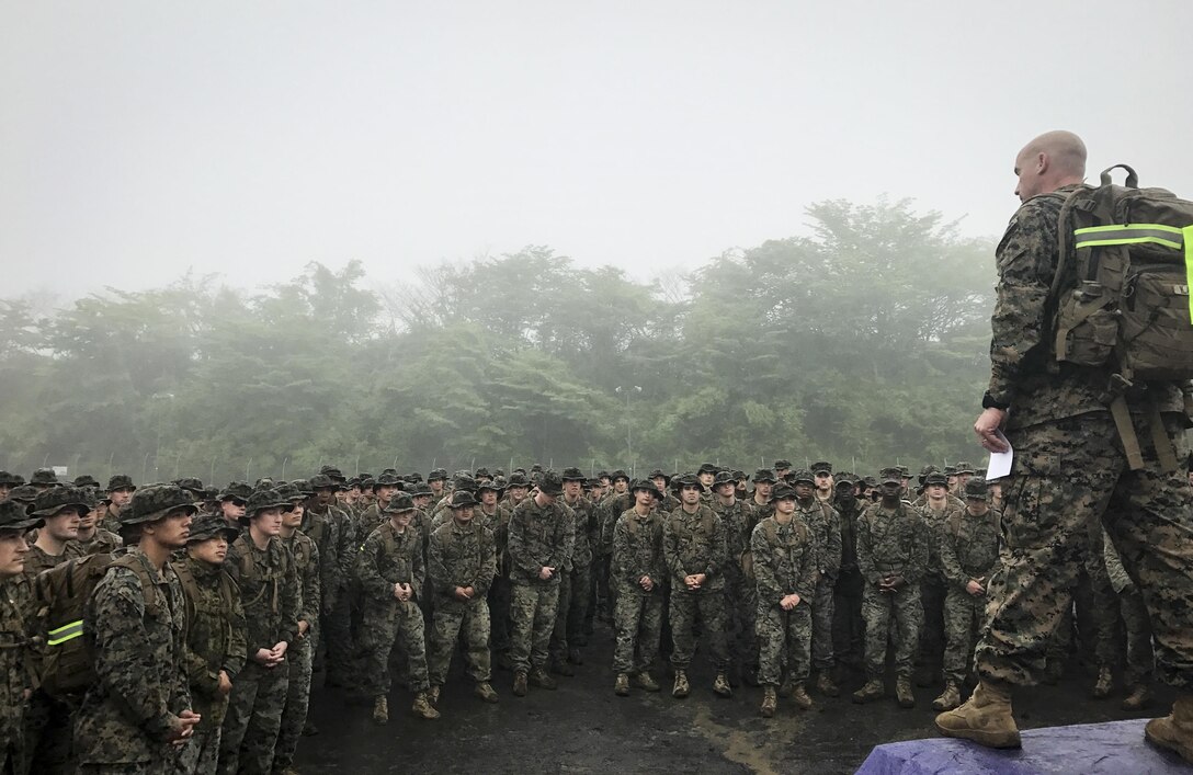 Lt. Col. Kemper Jones gives a motivational speech to his Marines during the 50-mile hike challenge, May 15-17, 2017, at Combined Arms Training Center Camp Fuji, Japan. The 50-mile hike challenge dates back to 1908 when President Theodore Roosevelt signed Executive Order 989, requiring lieutenants and captains in the Marine Corps to walk 50-miles in no more than 20 hours. Jones is the commanding officer of 3rd Battalion, 8th Marine Regiment. The Marines are with 3rd Battalion, 8th Marines forward deployed from Camp Lejeune, North Carolina to III Marine Expeditionary Force under the unit deployment program. (Photo courtesy of Maj. Patrick Murray)