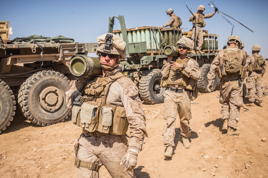 U.S. Marines with the 11th Marine Expeditionary Unit carry 155mm rounds to an M777 Howitzer gun line in preparation for fire missions in northern Syria as part of Combined Joint Task Force - Operation Inherent Resolve, Mar. 21, 2017. The 11th MEU was deployed in the Asia-Pacific and Middle Eastern regions and acted as a rapid response force available to conduct operations in support of U.S. Forces and allied and partner nations. More than 60 regional and international nations have joined together to enable partnered forces to defeat ISIS and restore stability and security. CJTF-OIR is the global Coalition to defeat ISIS in Iraq and Syria. 