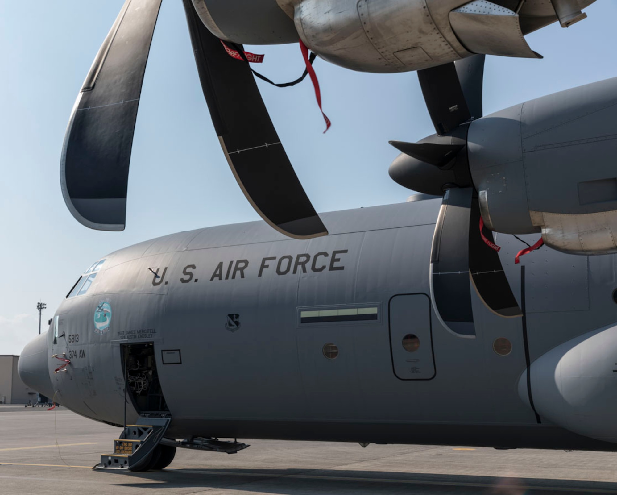 Nose art, “Spirit of Hope,” placed onto C-130J Super Hercules 15-5813 at Yokota Air Base, Japan, May 19, 2017. The artwork celebrates the United States Air Force's dedication to providing humanitarian assistance and disaster relief to nations throughout the Indo-Asia-Pacific region. The artwork itself is a rendering of an Air Force C-130 airdropping humanitarian aid during Operation Christmas Drop. For 65 years running, Yokota Air Base aircraft and personnel have supported this event. In 2016 alone, four C-130s from Yokota, along with the Royal Australian Air Force and Japan Air Self-Defense Force, airdropped 25 tons of aid to 25,000 people spread across 56 Micronesian islands. (U.S. Air Force photo by Yasuo Osakabe)