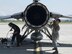 U.S. Air Force Staff Sgt. Charlie Bolles, left, a Pacific Air Forices F-16 Demonstration Team dedicated crew chief, finishes filling a tire while Airman 1st Class Andrew Keller, right, a 35th Aircraft Maintenance Squadron avionics specialist, closes open panels on the F-16 Fighting Falcon at Marine Corps Air Station Iwakuni, Japan, May 22, 2017. Keller is not a part of the demo team; however since the two avionics specialist were not available he had the opportunity to join the team for the Hofu Air Festival. (U.S. Air Force photo by Staff Sgt. Melanie Hutto)