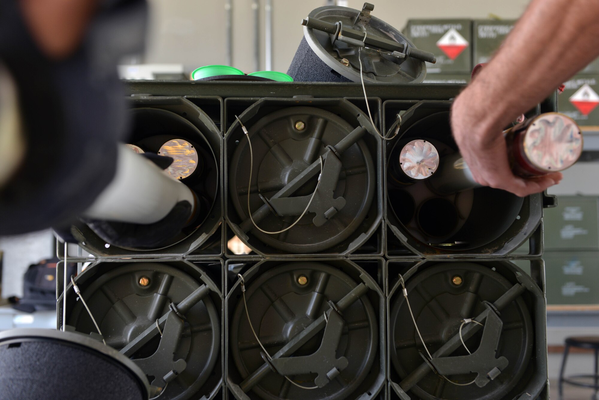 U.S. Airmen assigned to the 447th Expeditionary Aircraft Maintenance Squadron gather parts to assemble Advanced Precision Kill Weapon System (APKWS) rockets, May 24, 2017, at Incirlik Air Base, Turkey. The APKWS rocket uses semi-active laser guidance technology to strike armored targets in confined areas, providing greater accuracy and efficiency. (U.S. Air Force photo by Senior Airman John Nieves Camacho)