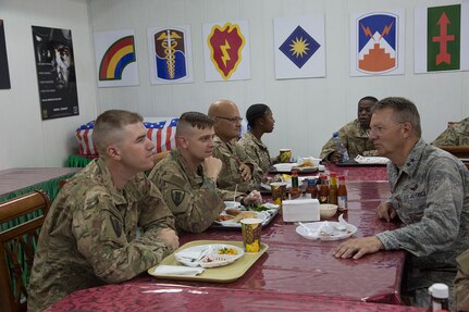 Major General Anthony German, the adjutant general of New York, meets with Soldiers of the 1156th Engineer Company during a visit to Camp Arifjan, Kuwait, on May 17, 2017. 