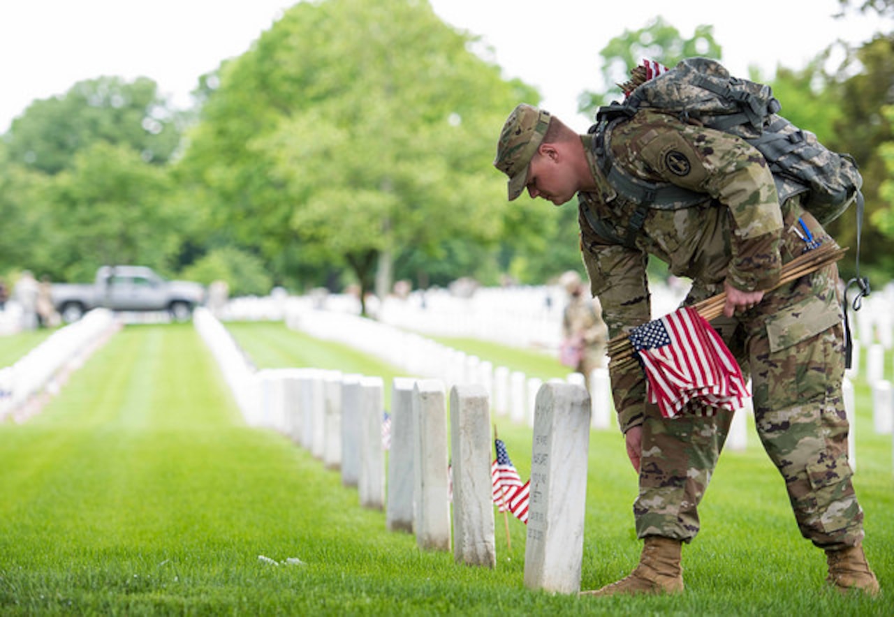 Soldiers from the 3rd U.S. Infantry Regiment (The Old Guard) participate in the “Flags-In” mission at Arlington National Cemetery, Va. May 25, 2017. Soldiers placed an American flag at every grave maker in the cemetery. The Old Guard has conducted this mission annually at Arlington National Cemetery prior to Memorial Day. Army photo by Sgt. Nicholas T. Holmes