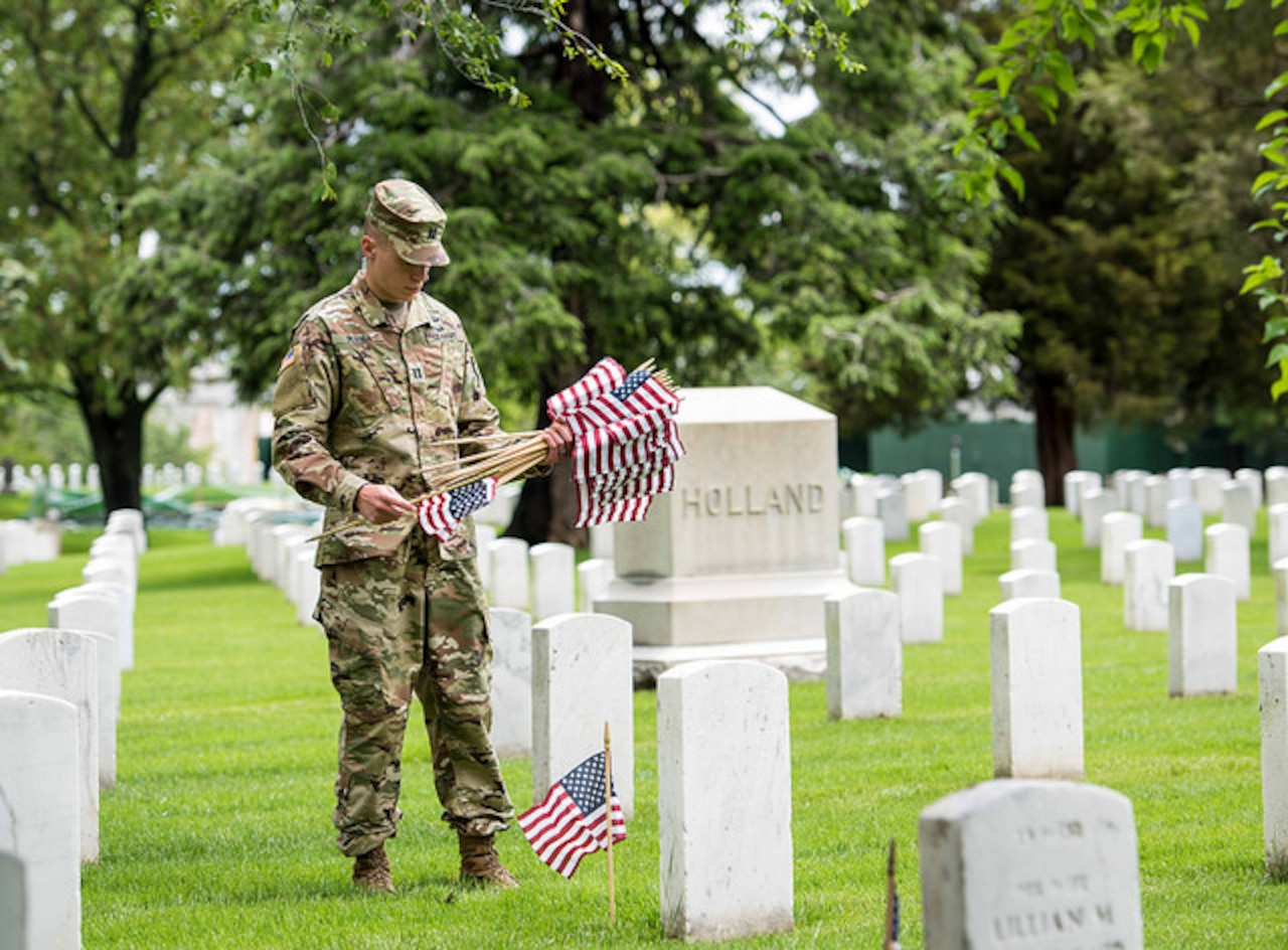 Soldiers from the 3rd U.S. Infantry Regiment (The Old Guard) participate in the “Flags-In” mission at Arlington National Cemetery, Va., May 25, 2017. Soldiers placed an American flag at every grave maker in the cemetery. The Old Guard has conducted this mission annually at Arlington National Cemetery prior to Memorial Day. Army photo by Sgt. Nicholas T. Holmes