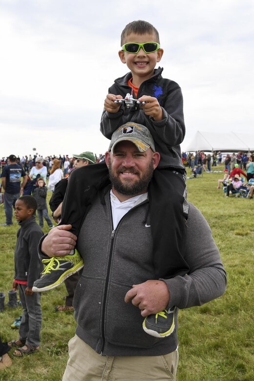 Visitors enjoy a day at the 2017 Wings Over Pittsburgh Open House/ Airshow at the Pittsburgh International Airport Air Reserve Station, Pa., May 14, 2017. The 2017 show marked the return of Wings Over Pittsburgh after a 6 year hiatus. (U.S. Air Force photo be Senior Airman Beth Kobily)