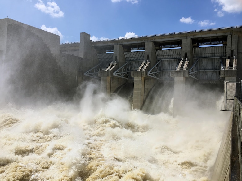 Truman Lake releases 12K cubic feet per second through the two power generation units and an additional 38K cfs through the tainter gates (pictured). We are coordinating with Ameren to maintain target levels in the Osage River. 

These releases are needed to get the lake back to a state where it can receive more water from the next rain events.