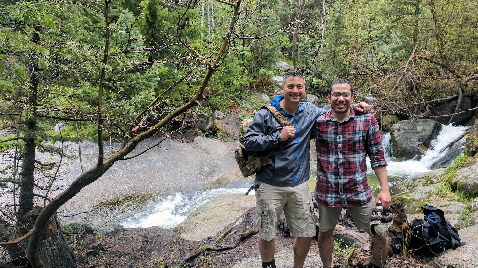 Tech. Sgt. Alister Clyne, left, poses with Marco Mora-Huizar May 21 along the Bells Canyon trail minutes after pulling Mora-Huizar from fast-moving Bells Canyon Creek above Lower Falls. (Courtesy photo)