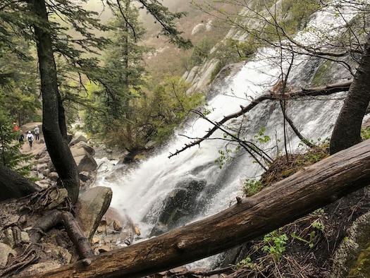 A view of Lower Falls from a path used by hikers to get to the flowing Bells Canyon Creek above. The photo was taken May 21 before Tech. Sgt. Alister Clyne pulled Marco Mora-Huizar from the fast-moving creek. (Courtesy photo)