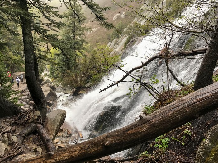 A view of Lower Falls from a path used by hikers to get to the flowing Bells Canyon Creek above. The photo was taken May 21 before Tech. Sgt. Alister Clyne pulled Marco Mora-Huizar from the fast-moving creek. (Courtesy photo)