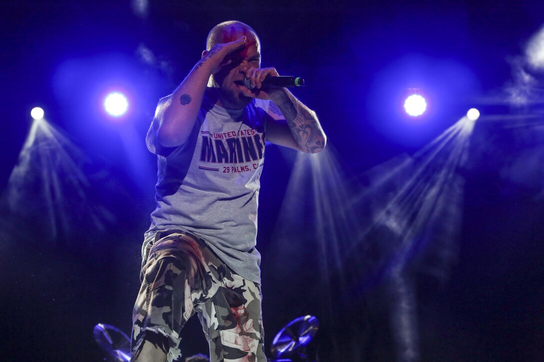 Ivan Moody, lead vocals, Five Finger Death Punch, performs for Combat Center patrons during the We Salute You Celebration at Lance Cpl. Torrey L. Gray Field aboard the Marine Corps Air Ground Combat Center, Twentynine Palms, Calif., May 19, 2017. Marine Corps Community Services hosted the event to provide entertainment to Marines and sailors aboard the Combat Center. (U.S. Marine Corps photo by Lance Cpl. Christian Lopez)