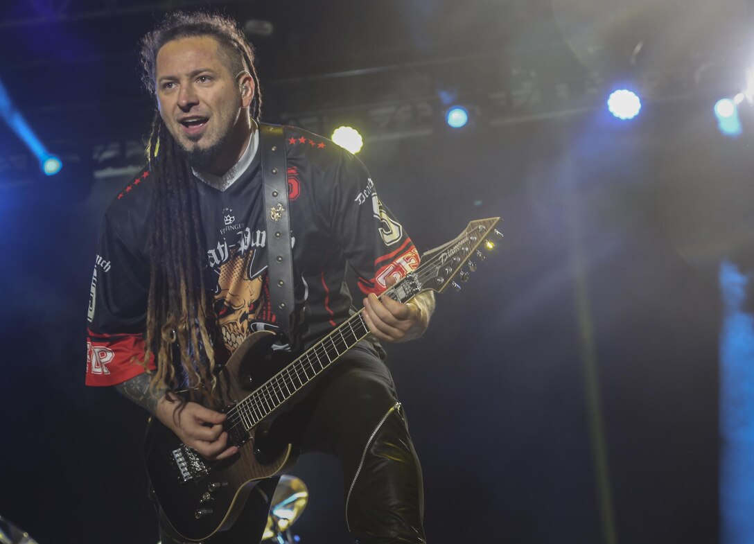 Zoltan Bathory, rhythm guitarist, Five Finger Death Punch, performs for Combat Center patrons during the We Salute You Celebration at Lance Cpl. Torrey L. Gray Field aboard the Marine Corps Air Ground Combat Center, Twentynine Palms, Calif., May 19, 2017. Marine Corps Community Services hosted the event to provide entertainment to Marines and sailors aboard the Combat Center. (U.S. Marine Corps photo by Lance Cpl. Christian Lopez)