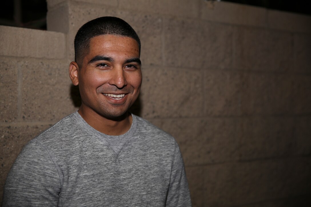 Lance Cpl. Adam Sevilla-Sanchez, administrative specialist, IPAC, grew-up in a rough neighborhood and through perseverance and self-motivation joined the Marine Corps. (U.S. Marine Corps Photo by Cpl. Julio McGraw)