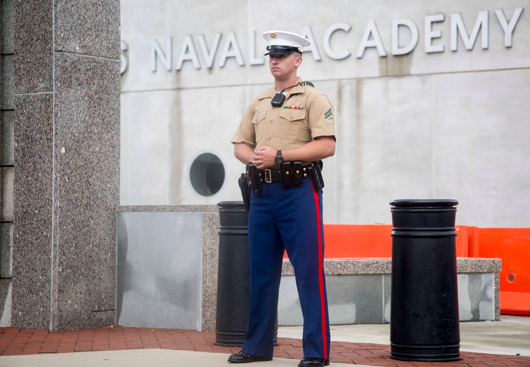 Corporal Austin Aldrich, section leader, Guard Company, Marine Barracks, assumes his post during the 2017 United States Naval Academy Commissioning Week, Annapolis, Md., May 25, 2017.  Guard Marines with Marine Barracks Washington were called upon to support as an additional security element for this year’s Commissioning Week. (Official Marine Corps photo by Cpl. Robert Knapp/Released)