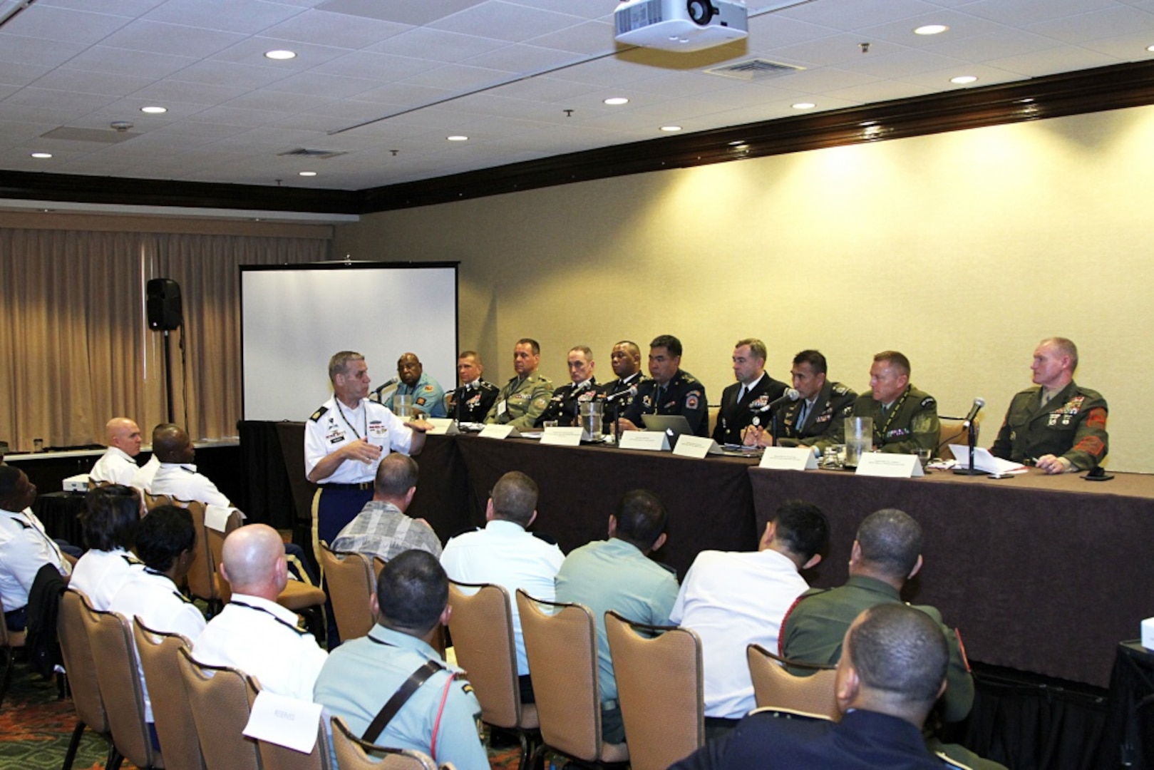 Command Sgt. Maj. Rick Merritt, Senior Enlisted Advisor for Eighth Army answers a question from the audience during the second annual Senior Enlisted Leaders forum held in conjunction with the fourth annual Land Power in the Pacific Symposium and Exhibition in Honolulu, May 24. Nearly 300 noncommissioned officers filled the room.