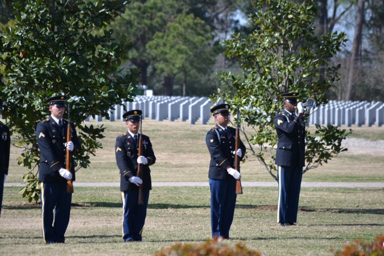 Service members on the Texas Military Department's Military Funeral Honors team prepare to issue a three-volley rifle salute during the funeral of a U.S. veteran. Texas National Guard Military Funeral Honors courtesy photo