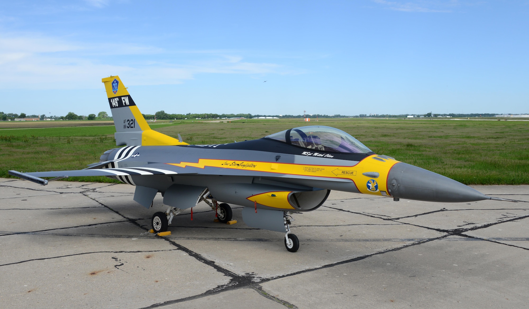 A U.S. Air Force F-16 assigned to the 149th Fighter Wing, Texas Air National Guard, painted with World War II heritage markings is parked outside the Air National Guard Paint Facility in Sioux City, Iowa on May 26, 2017. The 149th FW received authorization for the nonstandard markings in order to commemorate the United States Air Force 70th Anniversary. The markings represent the lineage of the 149th FW with the unit’s origins dating back to the 396th Fighter Squadron “Thunder Bums” P-47 paint scheme from 1944. 
U.S. Air National Guard Photo by: Master Sgt. Vincent De Groot 185th ARW PA/Released