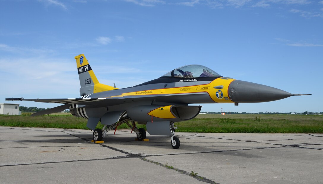 A U.S. Air Force F-16 assigned to the 149th Fighter Wing, Texas Air National Guard, painted with World War II heritage markings is parked outside the Air National Guard Paint Facility in Sioux City, Iowa on May 26, 2017. The 149th FW received authorization for the nonstandard markings in order to commemorate the United States Air Force 70th Anniversary. The markings represent the lineage of the 149th FW with the unit’s origins dating back to the 396th Fighter Squadron “Thunder Bums” P-47 paint scheme from 1944. 
U.S. Air National Guard Photo by: Master Sgt. Vincent De Groot 185th ARW PA/Released